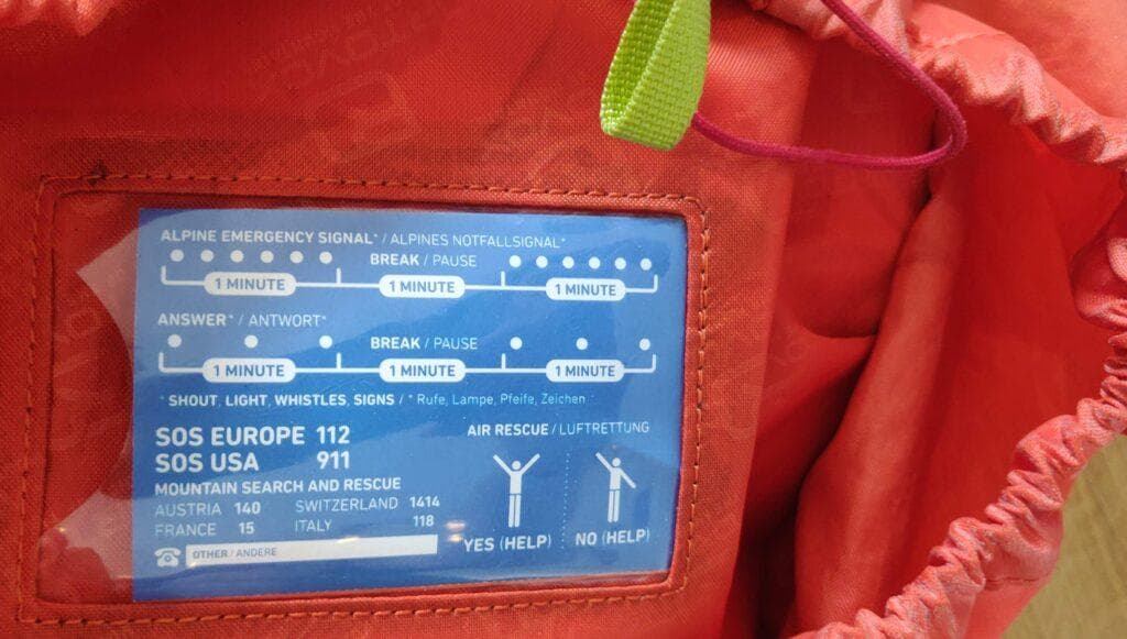 Emergency information on the inside of my backpack's top lid